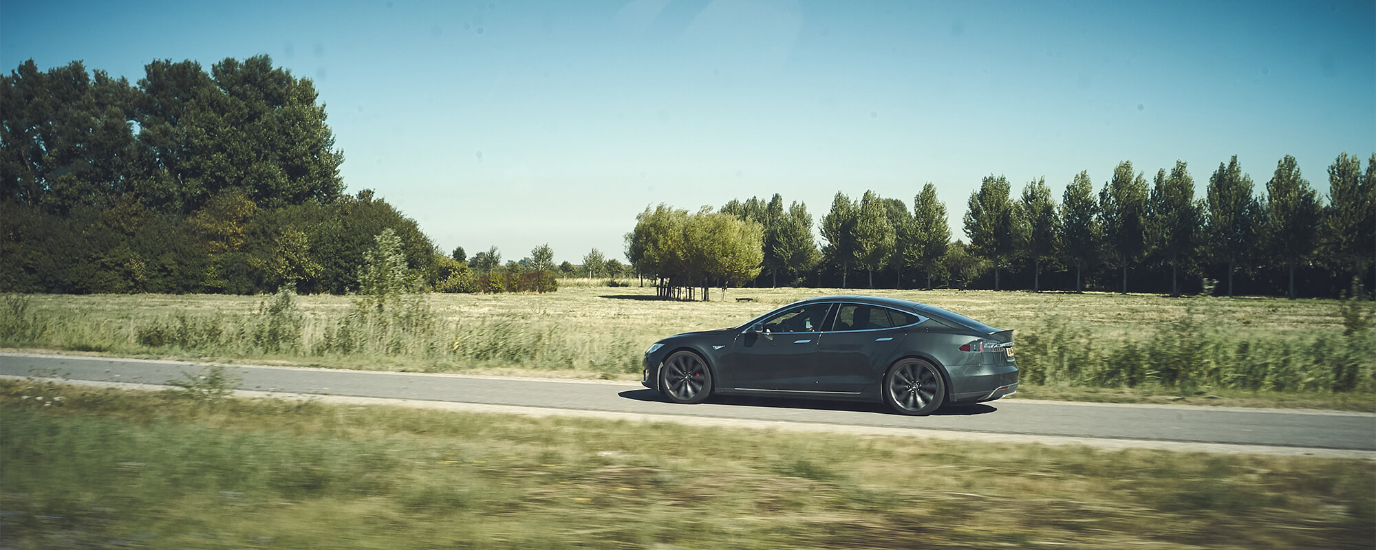 Model S Driving in Field